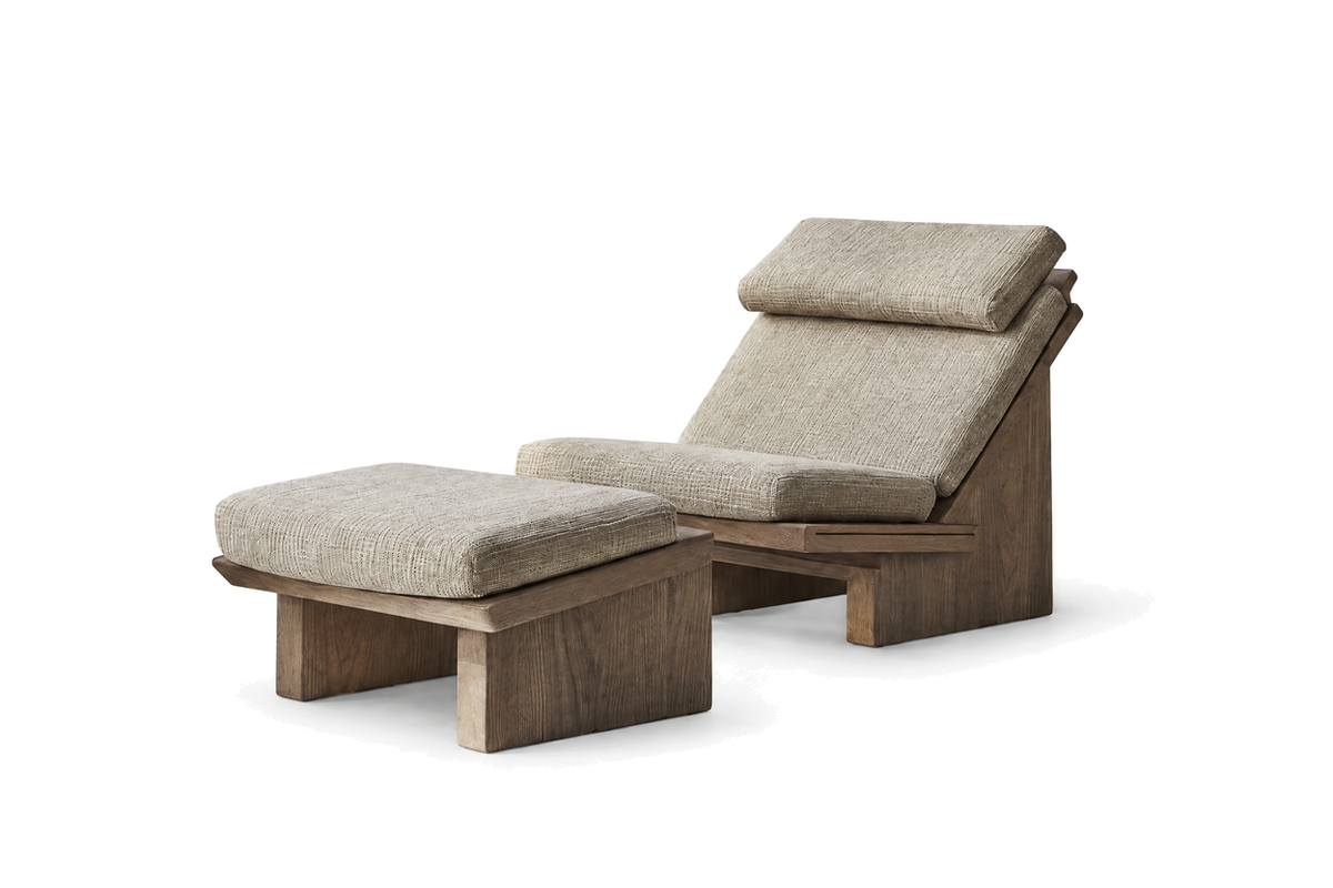 House of Coda Buttress teak outdoor lounger and ottoman with light cushions on a white background.